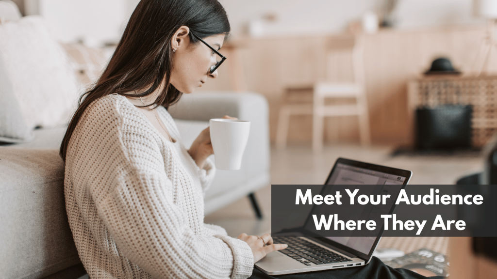 young businesswoman using laptop while taking tea cup at home