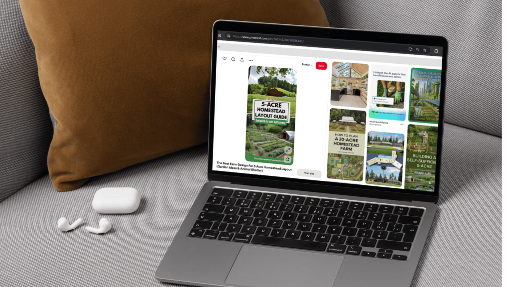 A laptop on top of a gray sofa