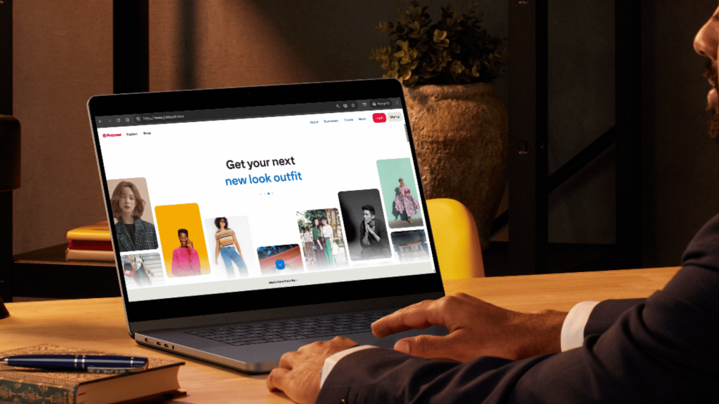 A man working on his Pinterest through his laptop