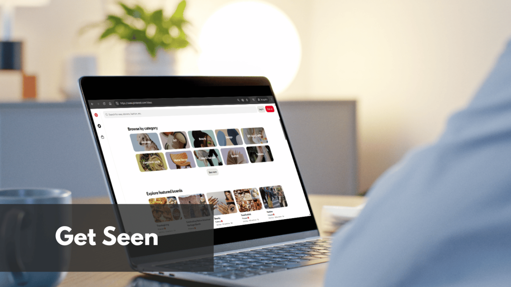 A man working on his Pinterest through his laptop