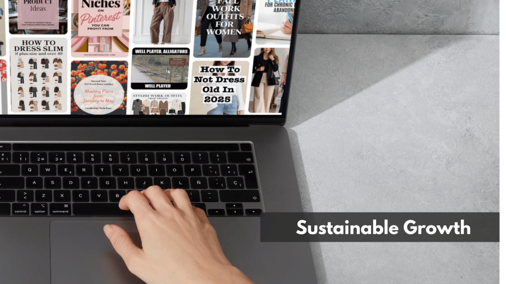 A woman working on her laptop on a gray desk