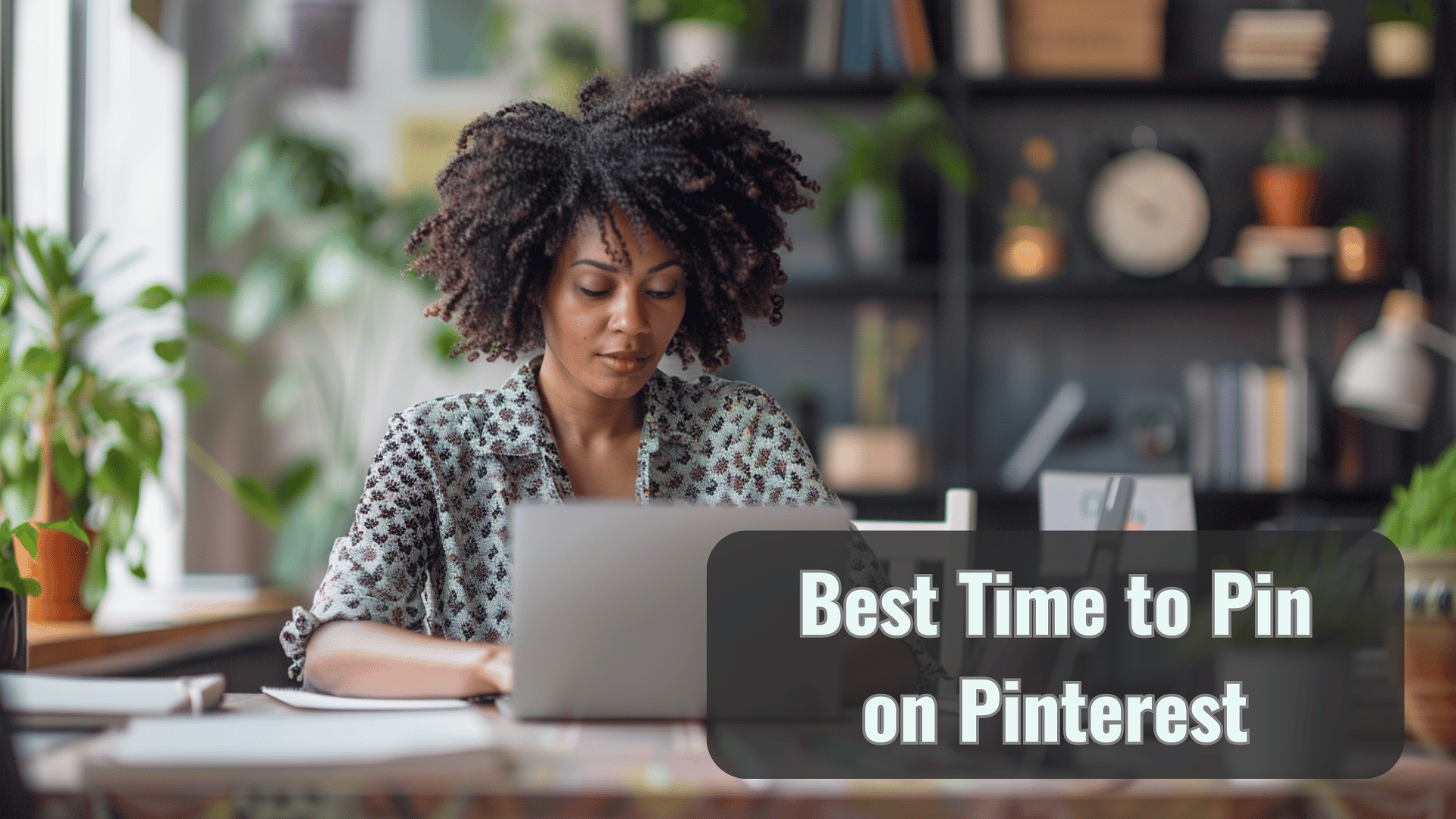 Woman planning Pinterest content on laptop with text overlay about optimal pinning times for engagement.