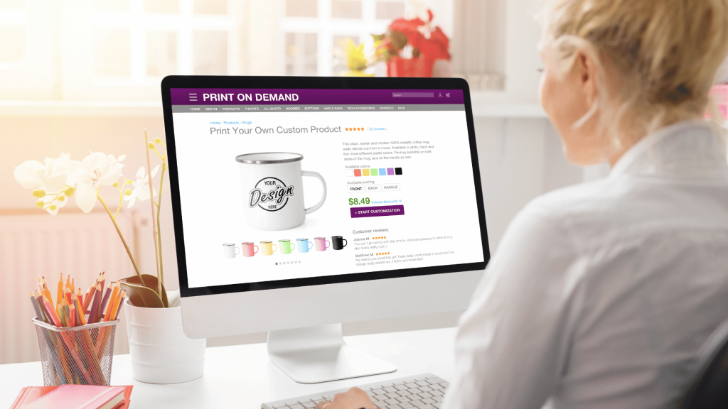 Person customizing a product on a print-on-demand website, designing a personalized mug using online tools."